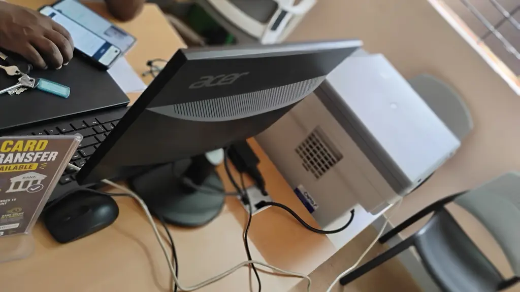 Service desk inside the C2C Enterprises office with computer and printer